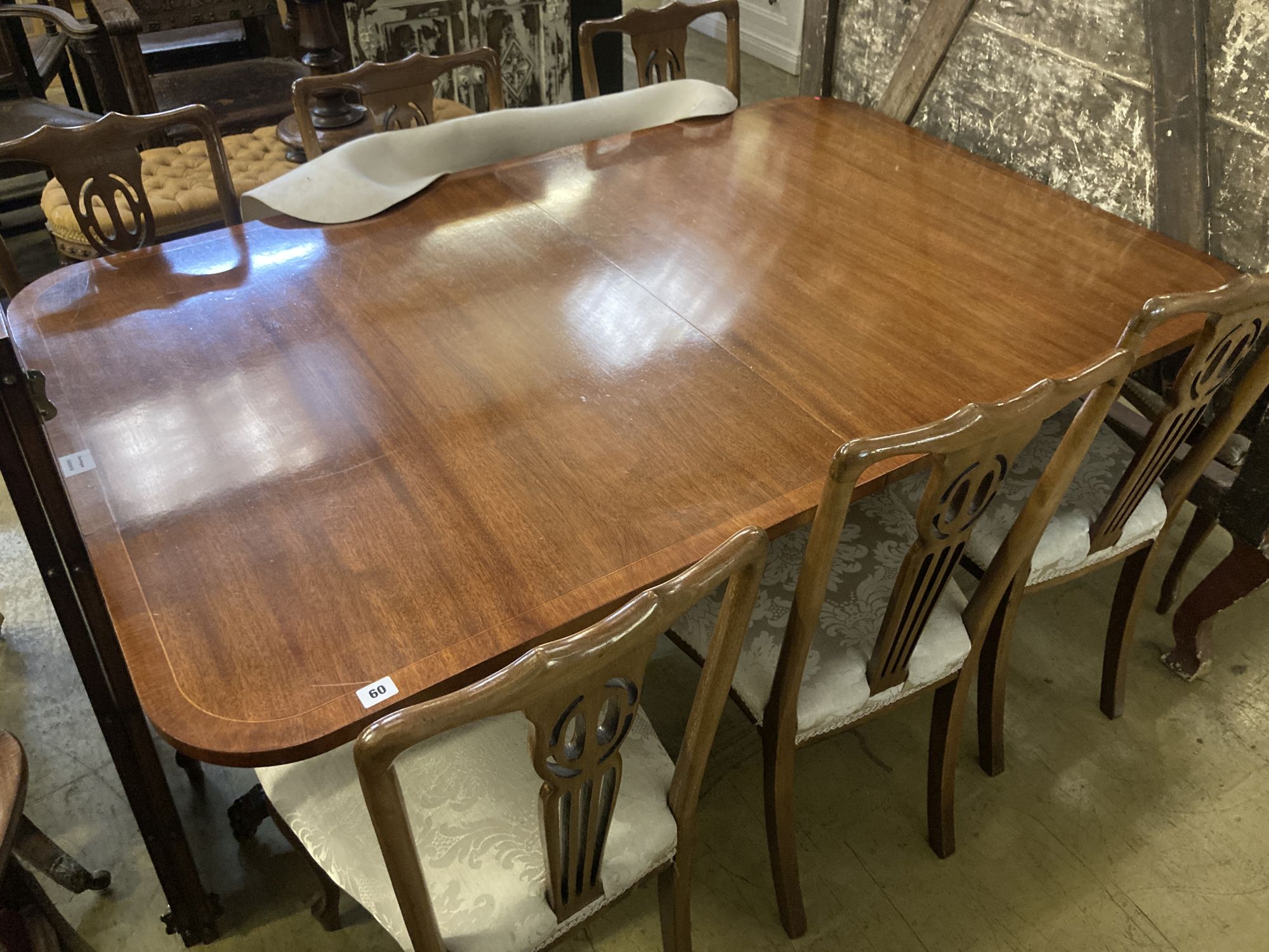 A Regency style mahogany two pillar extending dining table, length 240cm extended (two spare leaves), width 98cm, height 75cm